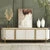 Arabelle Luxe Modern Marble Finish TV Stand with elegant decor and gold accents.